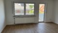 Wohnzimmer mit Balkon