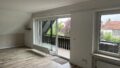 Wohnzimmer mit Balkon