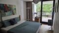 Schlafzimmer mit Zugang zur Terasse